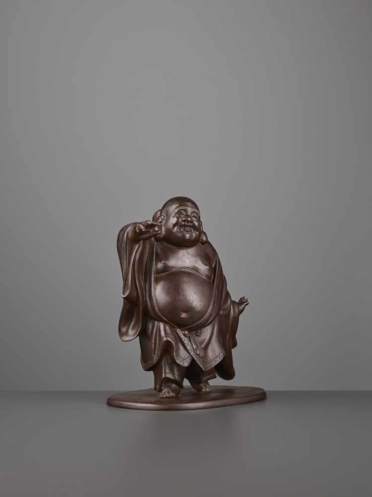 A CHARMING BRONZE OF HOTEI