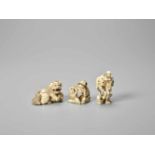 A GROUP OF THREE IVORY NETSUKE