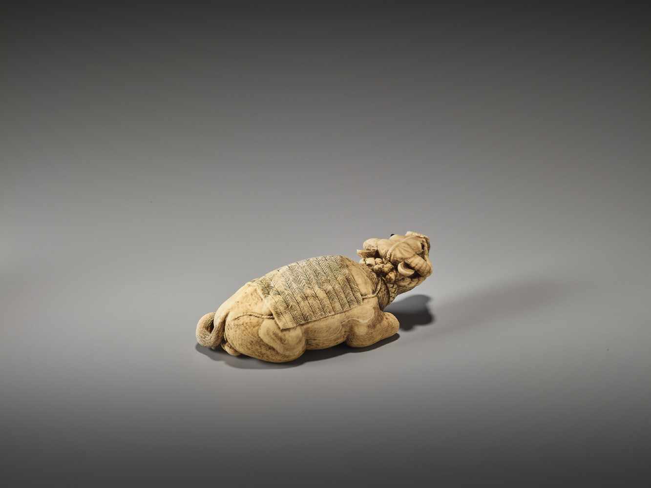 AN IVORY OKIMONO OF A RECUMBENT OX BY GOYOSAI - Image 4 of 7