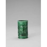 AN EMERALD GREEN GLAZED POTTERY ‘WEIQI PLAYERS’ BITONG, KANGXI <br