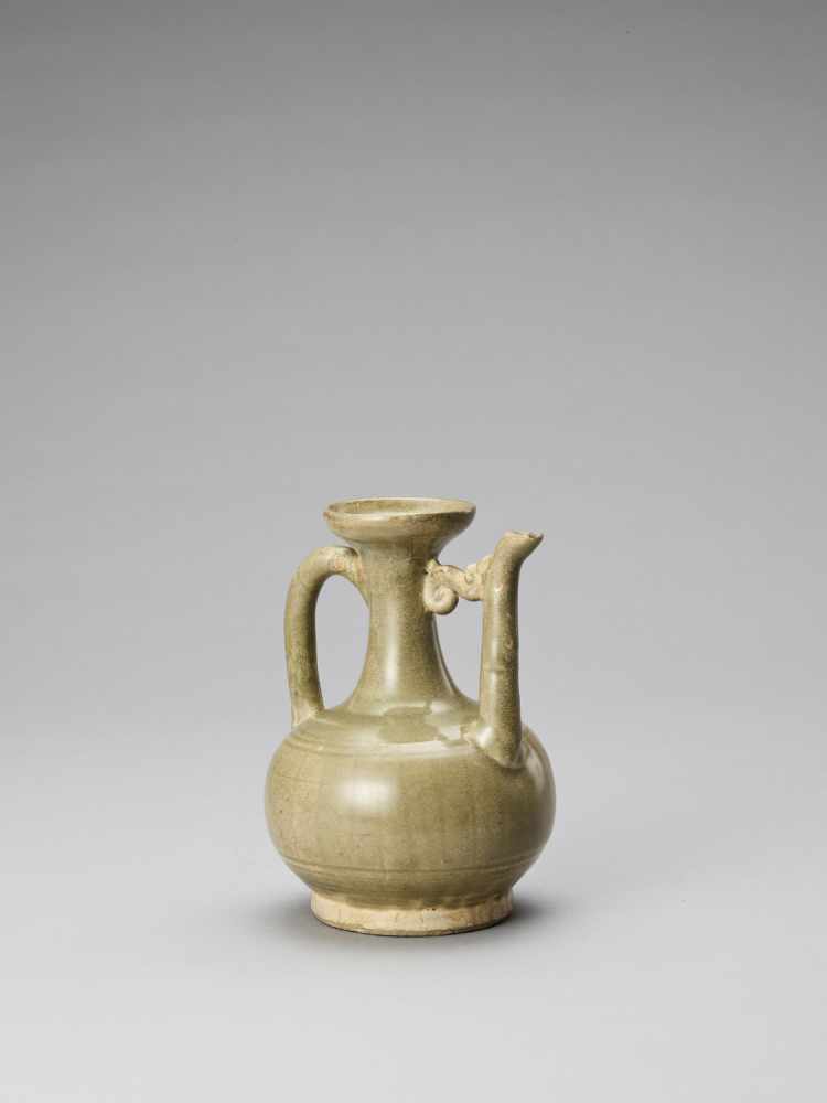 A CELADON GLAZED POTTERY EWER, TANG OR LIAO