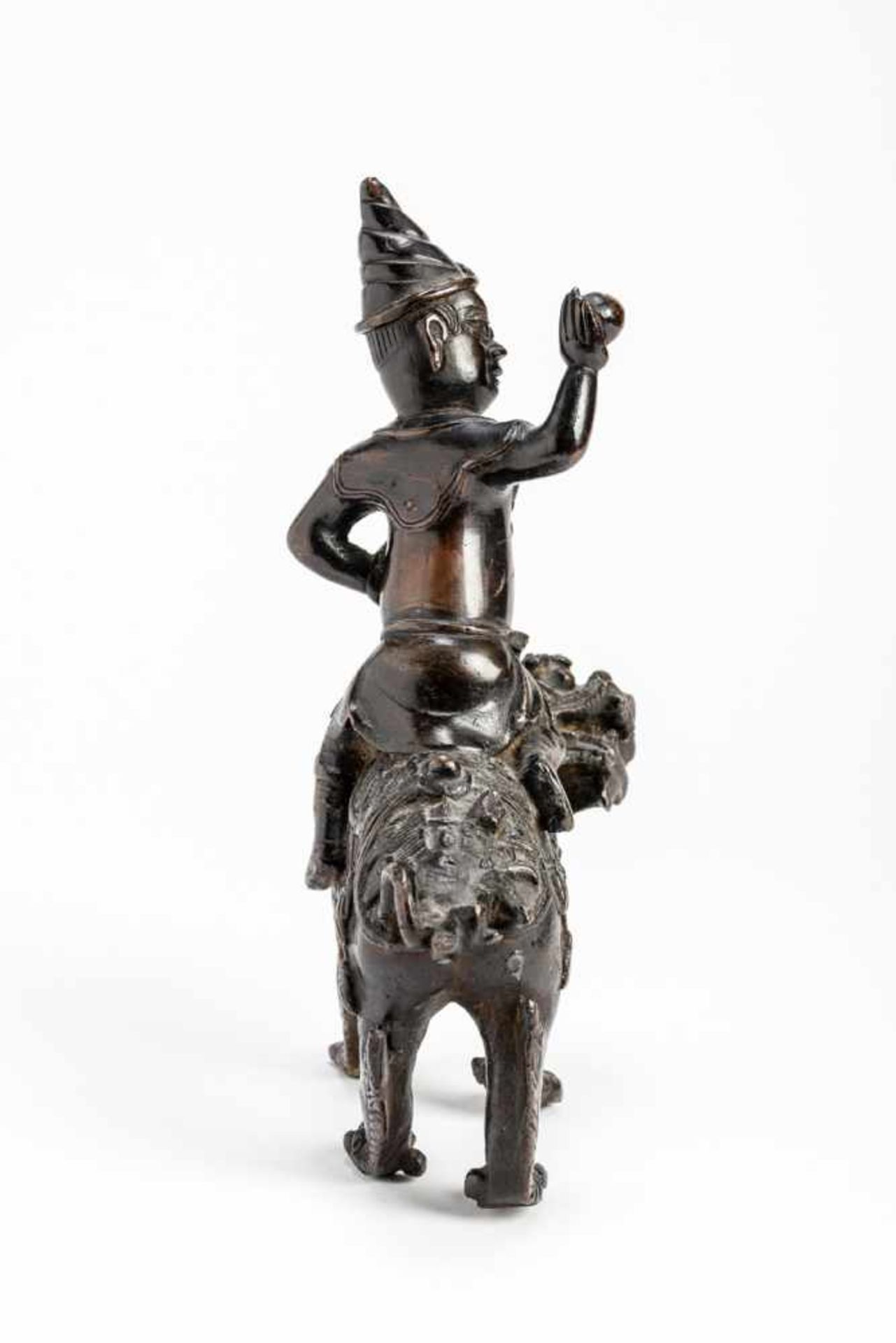 A BRONZE GUARDIAN DEITY RIDING ON A LION - Image 4 of 7