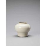 A WHITE GLAZED DEHUA PORCELAIN JAR, MING