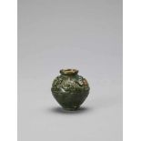 AN EMERALD GREEN-GLAZED CERAMIC MINIATURE URN, TANG