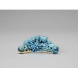 A ‘SQUIRRELS AND GRAPES’ PORCELAIN BRUSH REST, KANGXI <br