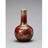 A LANGYAO GLAZED AND GILT-PAINTED BOTTLE VASE, QING