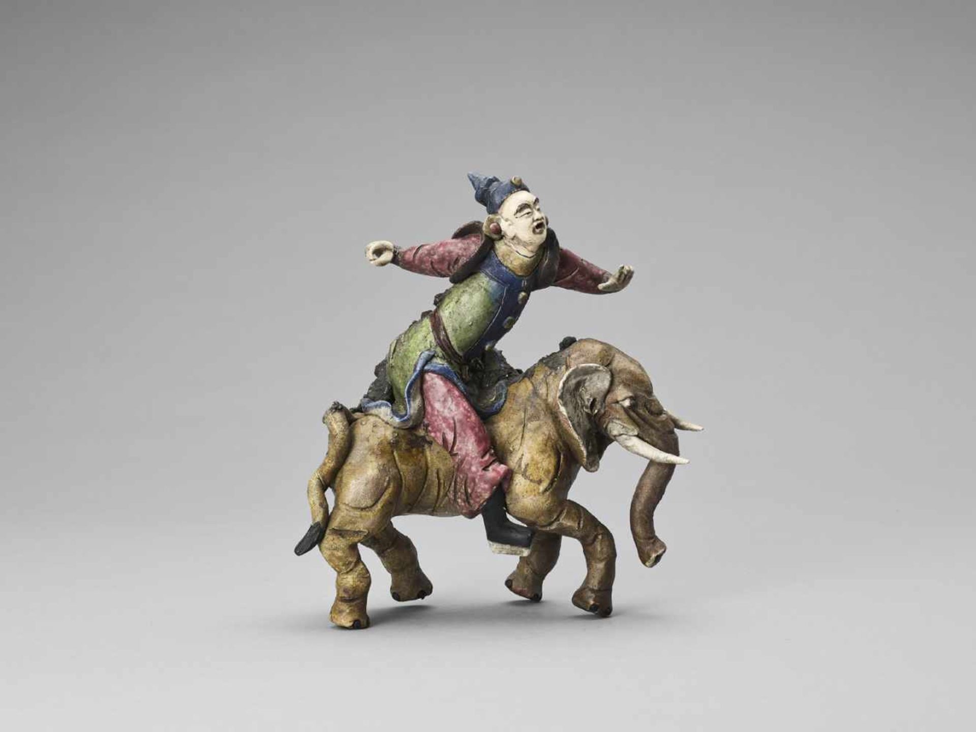 A GLAZED TERRACOTTA FIGURE OF A DIGNITARY RIDING AN ELEPHANT, MID-QING - Bild 9 aus 10