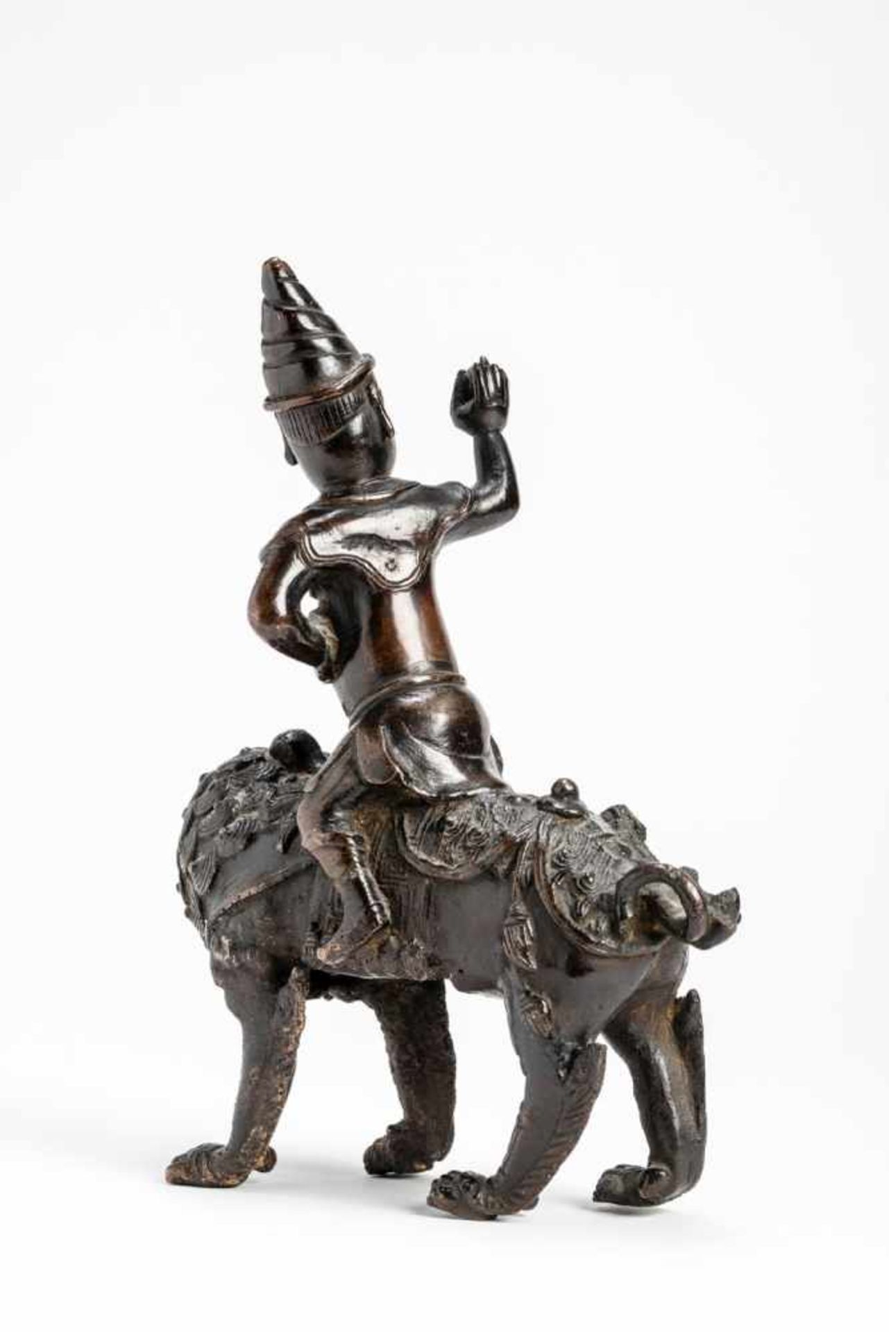 A BRONZE GUARDIAN DEITY RIDING ON A LION - Image 3 of 7