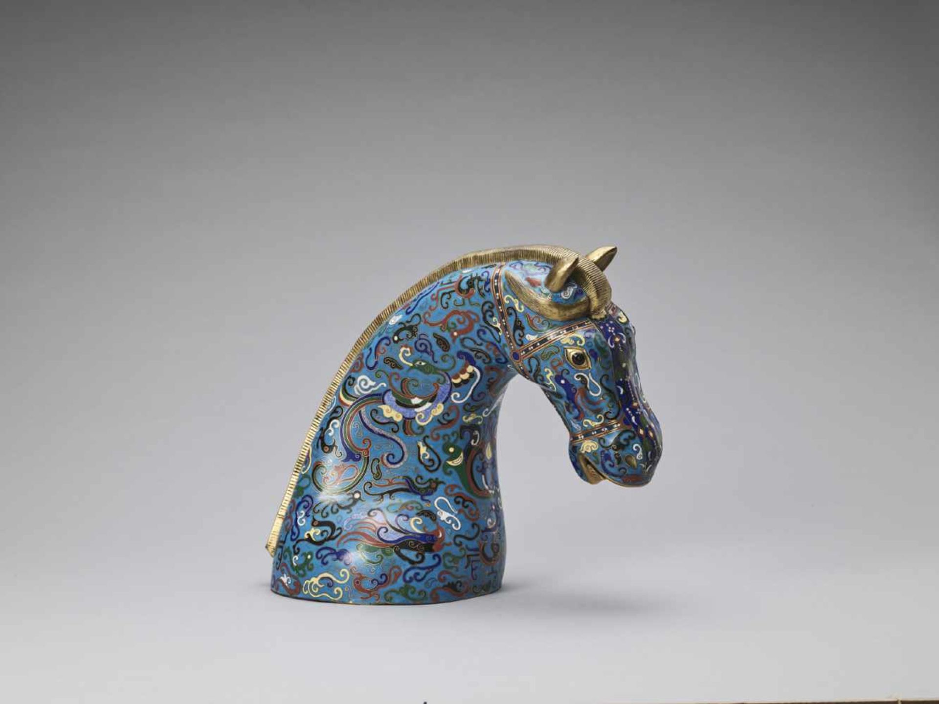 A GILT CLOISONNÉ ENAMEL HEAD OF A HORSE, REPUBLIC <