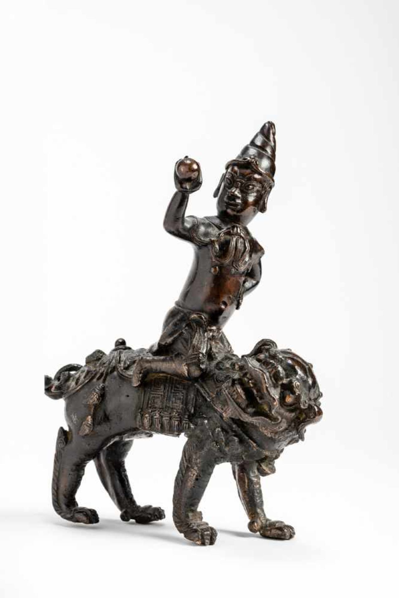 A BRONZE GUARDIAN DEITY RIDING ON A LION - Image 5 of 7