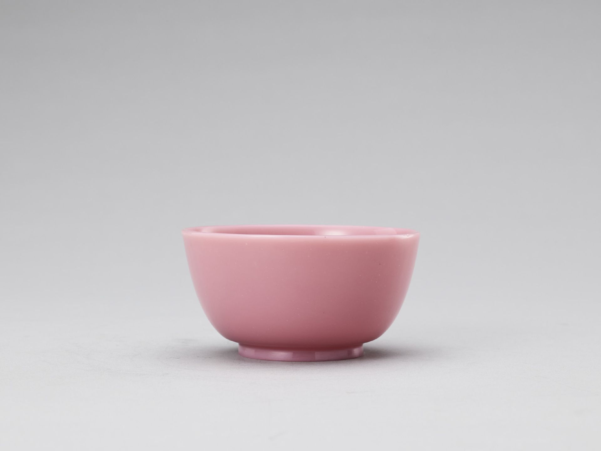 A SMALL PINK GLASS BOWL, QING