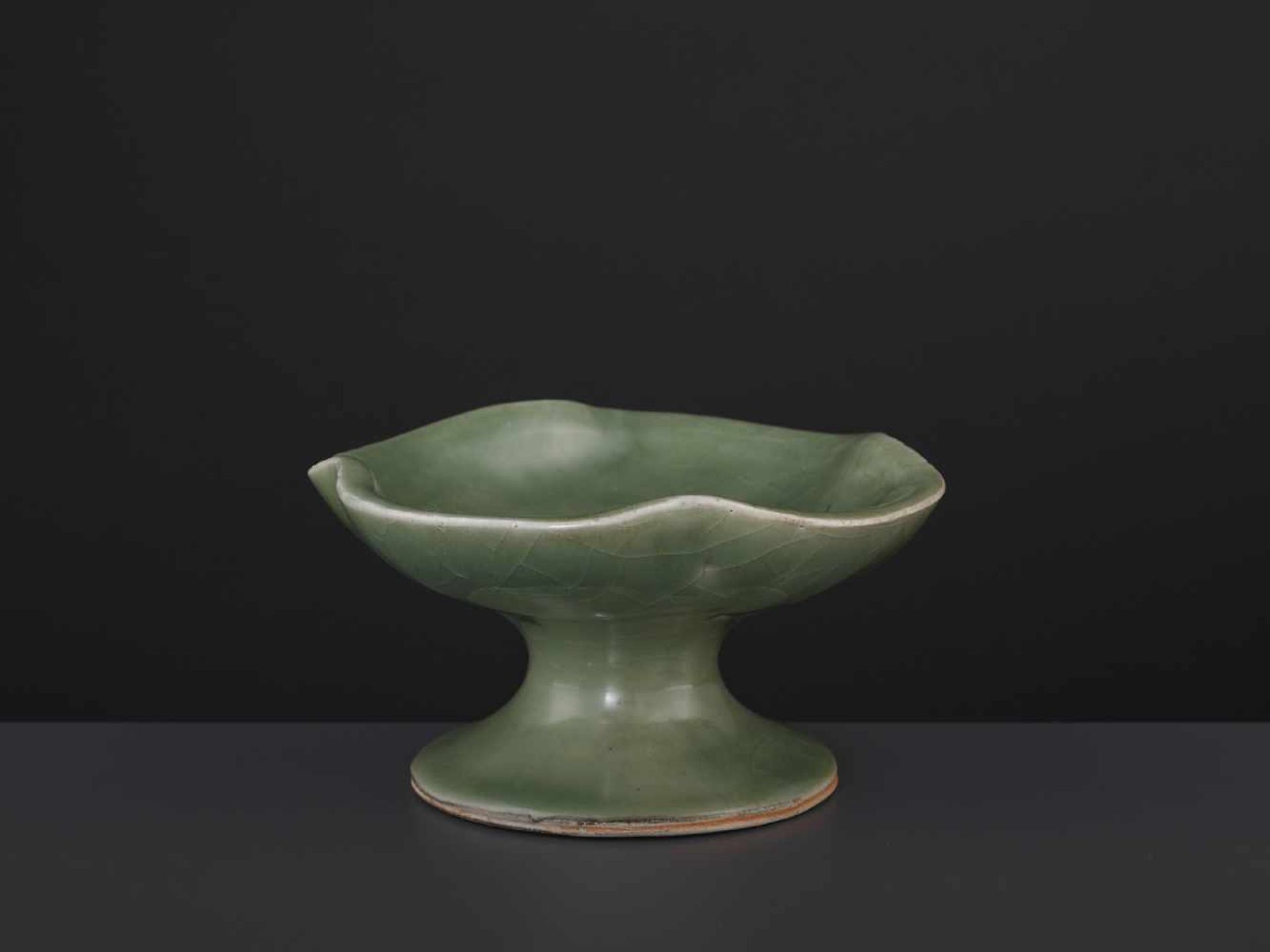 A CELADON STEM CUP, QING