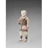 A TERRACOTTA FIGURE OF A GUARDIAN, HAN