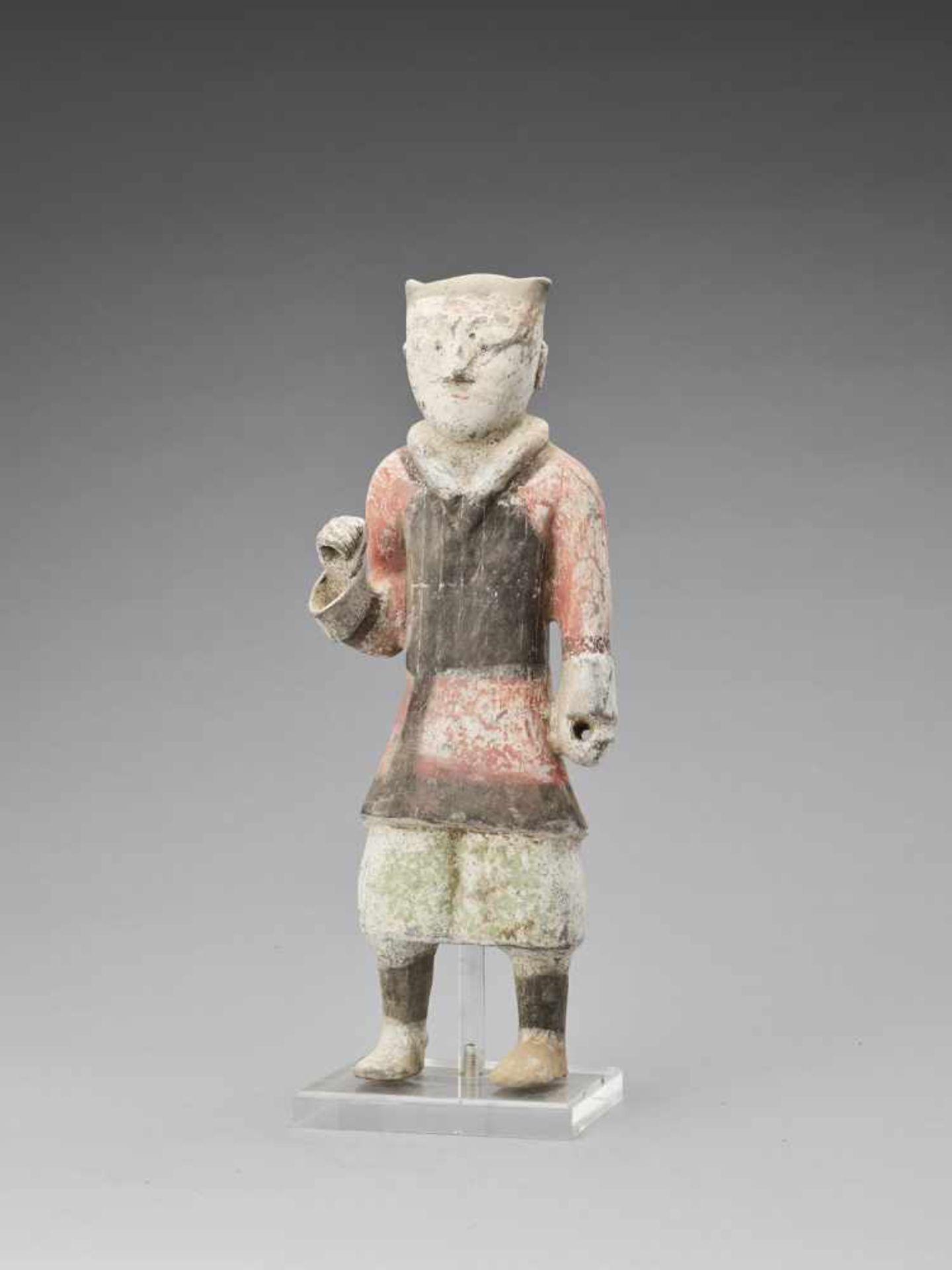 A TERRACOTTA FIGURE OF A GUARDIAN, HAN