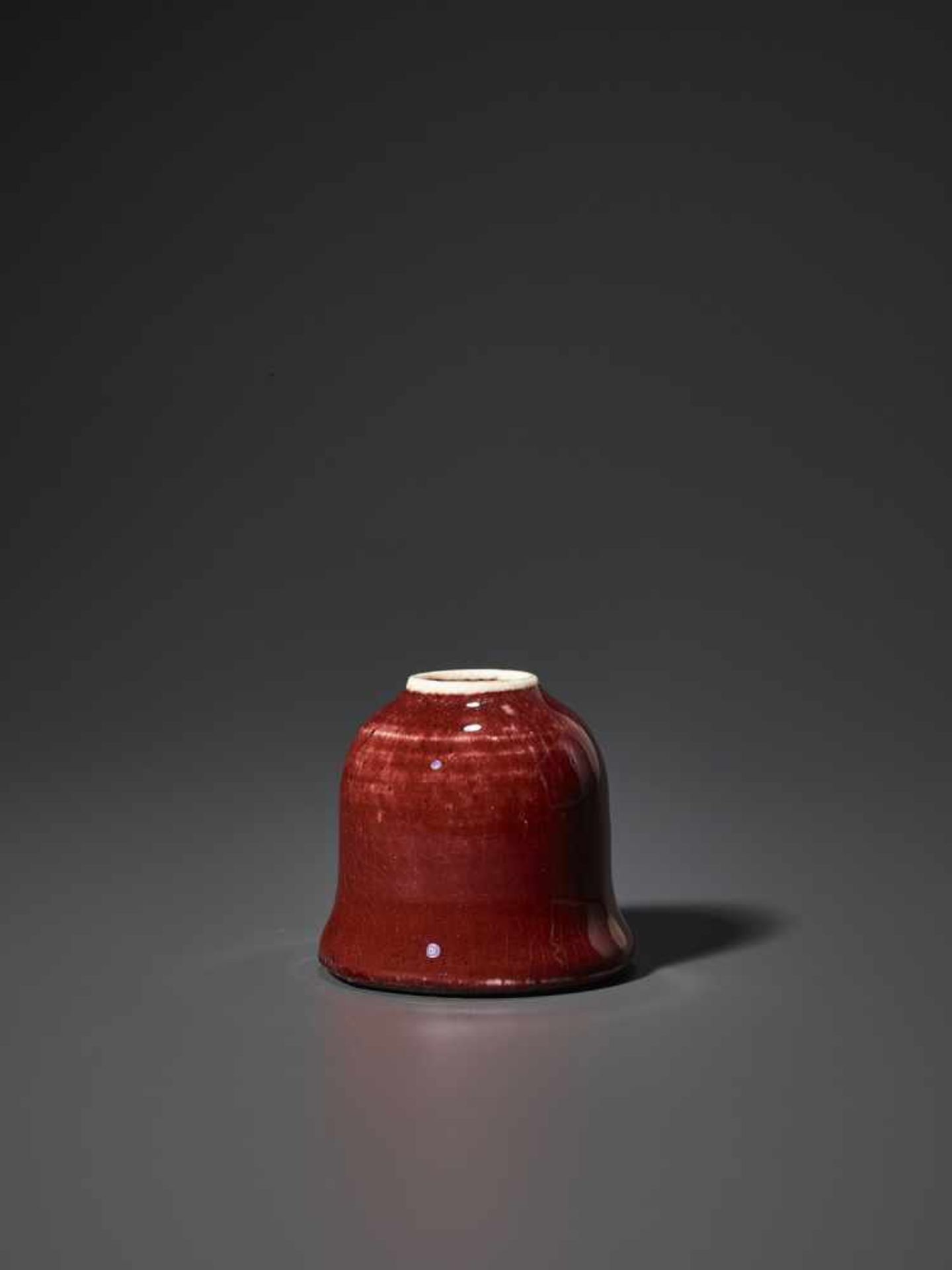 A COPPER-RED GLAZED BEEHIVE WATER POT, QING