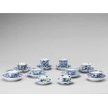 FIVE PAIRS OF BLUE AND WHITE CUPS WITH MATCHING PLATES