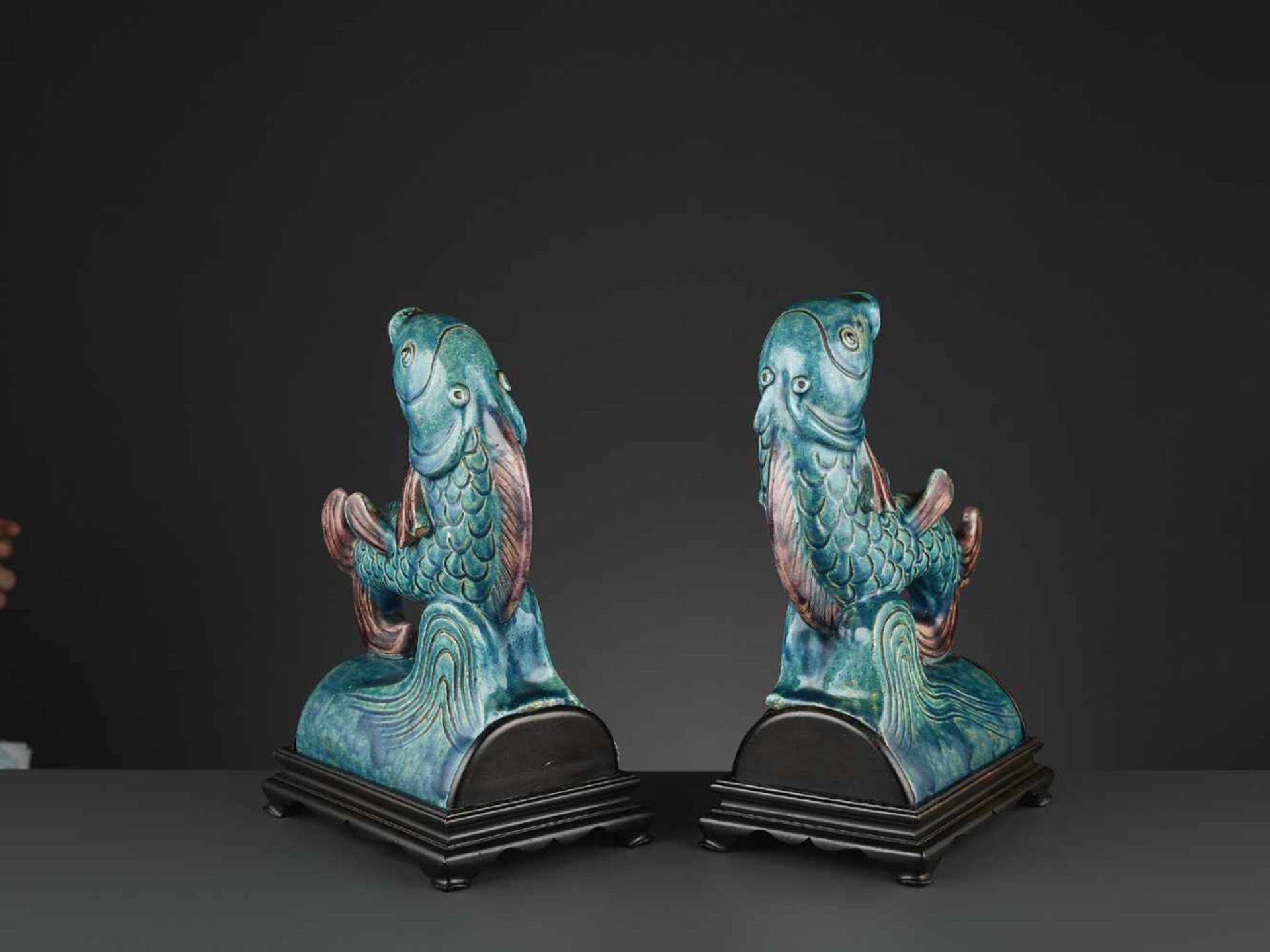 TWO AUBERGINE AND TURQUOISE GLAZED ‘FISH’ ROOF TILES, MING <br - Image 9 of 11