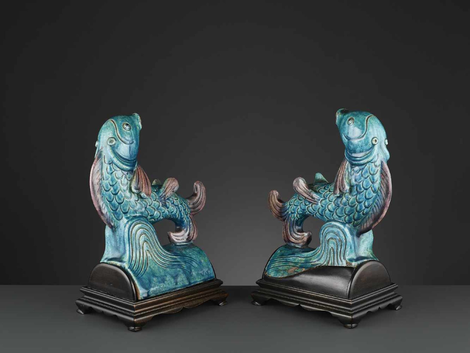 TWO AUBERGINE AND TURQUOISE GLAZED ‘FISH’ ROOF TILES, MING <br - Image 8 of 11