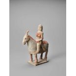 A TERRACOTTA FIGURE OF A HORSE AND RIDER, NORTHERN WEI