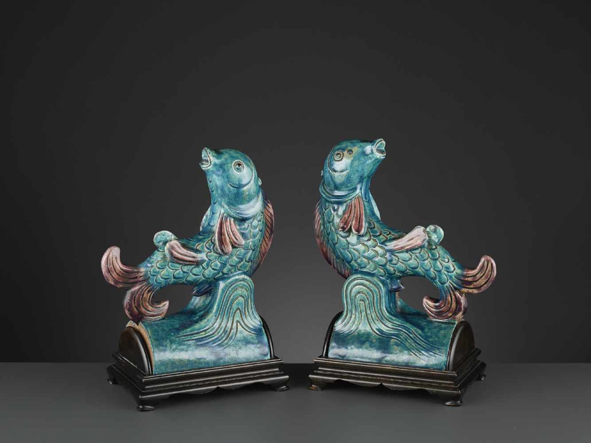 TWO AUBERGINE AND TURQUOISE GLAZED ‘FISH’ ROOF TILES, MING <br - Image 2 of 11