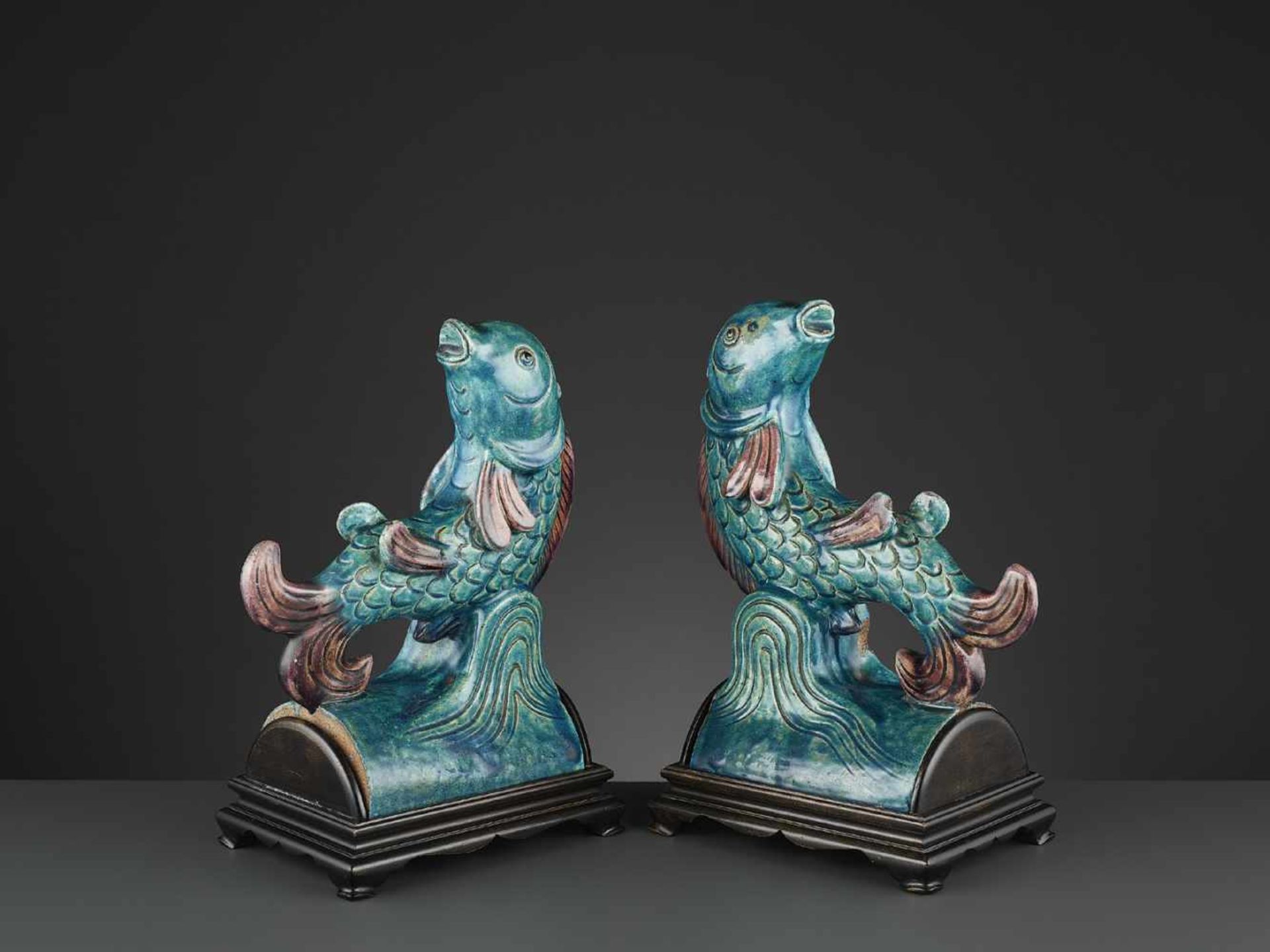 TWO AUBERGINE AND TURQUOISE GLAZED ‘FISH’ ROOF TILES, MING <br - Image 3 of 11