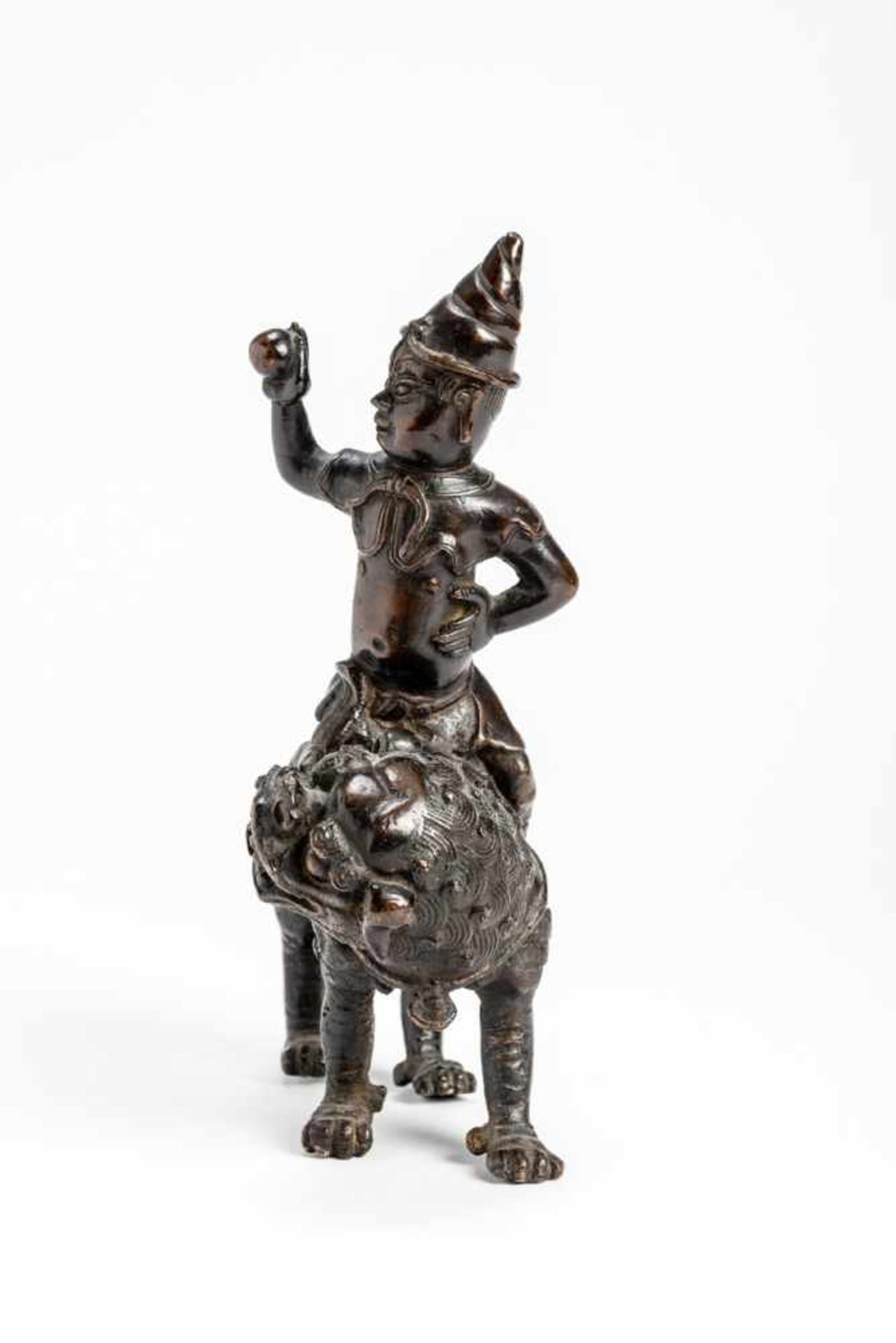 A BRONZE GUARDIAN DEITY RIDING ON A LION - Image 6 of 7
