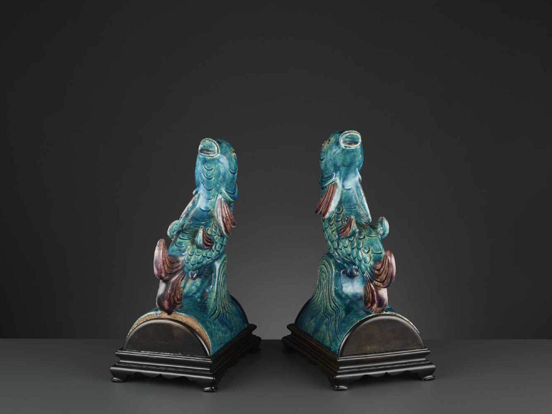 TWO AUBERGINE AND TURQUOISE GLAZED ‘FISH’ ROOF TILES, MING <br - Image 4 of 11