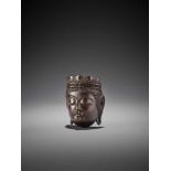 NAITO KOSEKI: AN IMPORTANT AND LARGE WOOD GYODO MASK NETSUKE OF KANNON