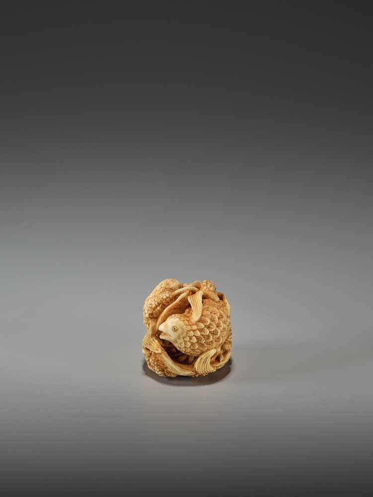 KAGETOSHI: AN IVORY NETSUKE OF TWO QUAILS