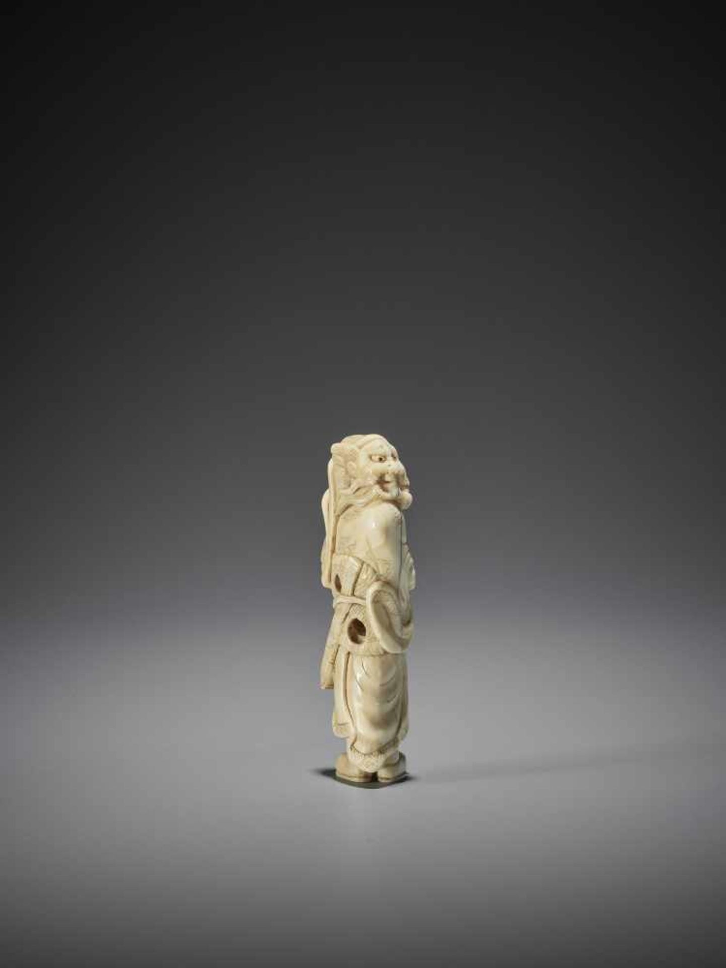 AN IVORY NETSUKE OF SHOKI - Image 8 of 9