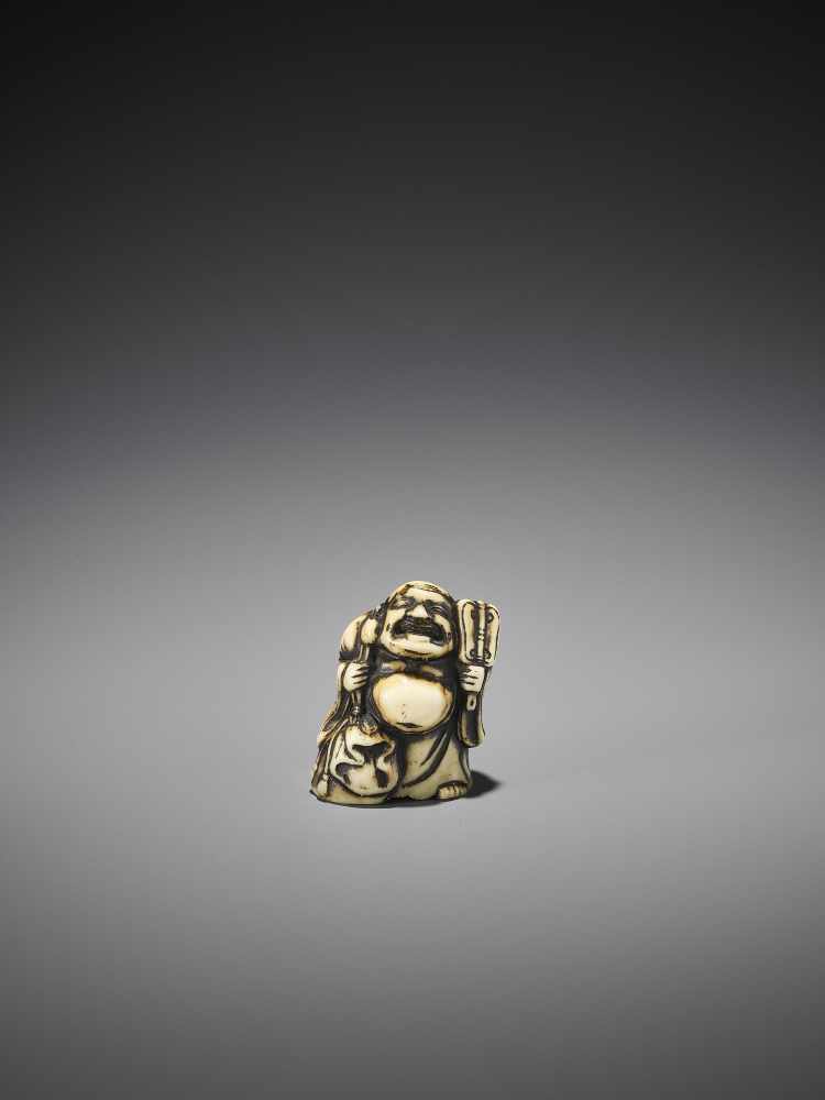 A RARE AND EARLY MARINE IVORY NETSUKE OF A BIZEN MODEL OF HOTEI