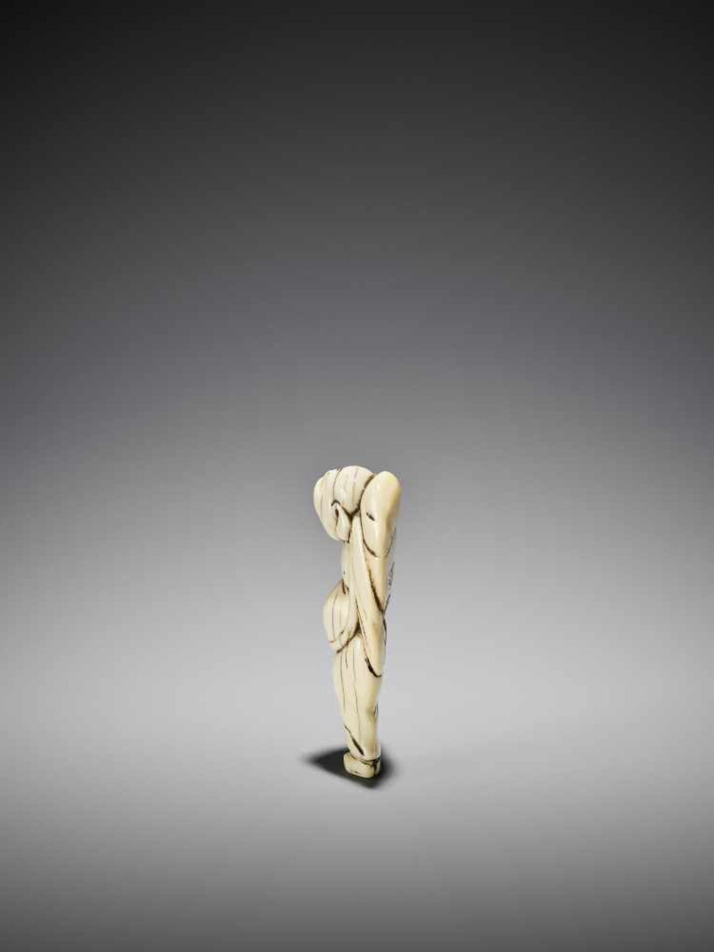 AN IVORY NETSUKE OF HOTEI - Image 4 of 7