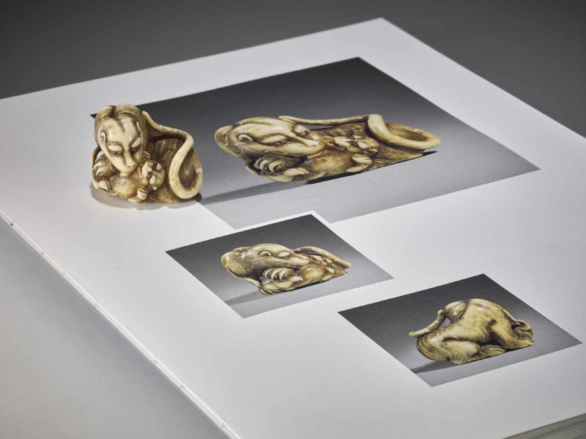 UNSHO HAKURYU I: AN EXCEPTIONAL IVORY NETSUKE OF A TIGER WITH CUB - Image 4 of 10