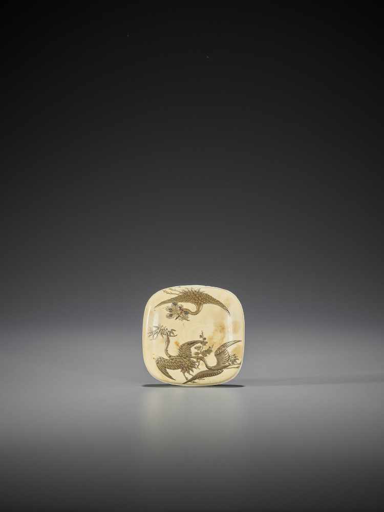 A LACQUERED IVORY HAKO NETSUKE WITH CRANES AND THREE FRIENDS OF WINTER