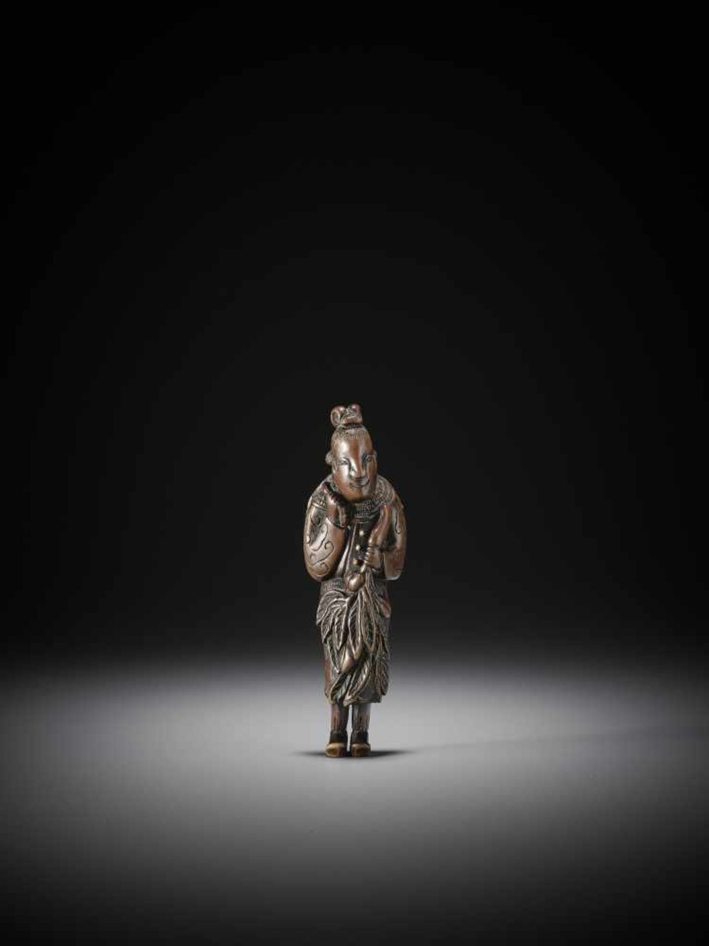 A TALL WOOD NETSUKE OF SEIOBO