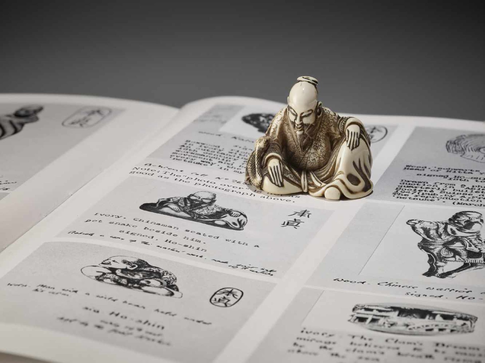 HOSHIN: A RARE IVORY NETSUKE OF A CHINESE SAGE WITH SNAKE - Image 3 of 13