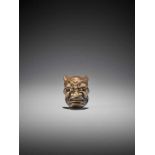 A WOOD MASK NETSUKE OF AN ONI