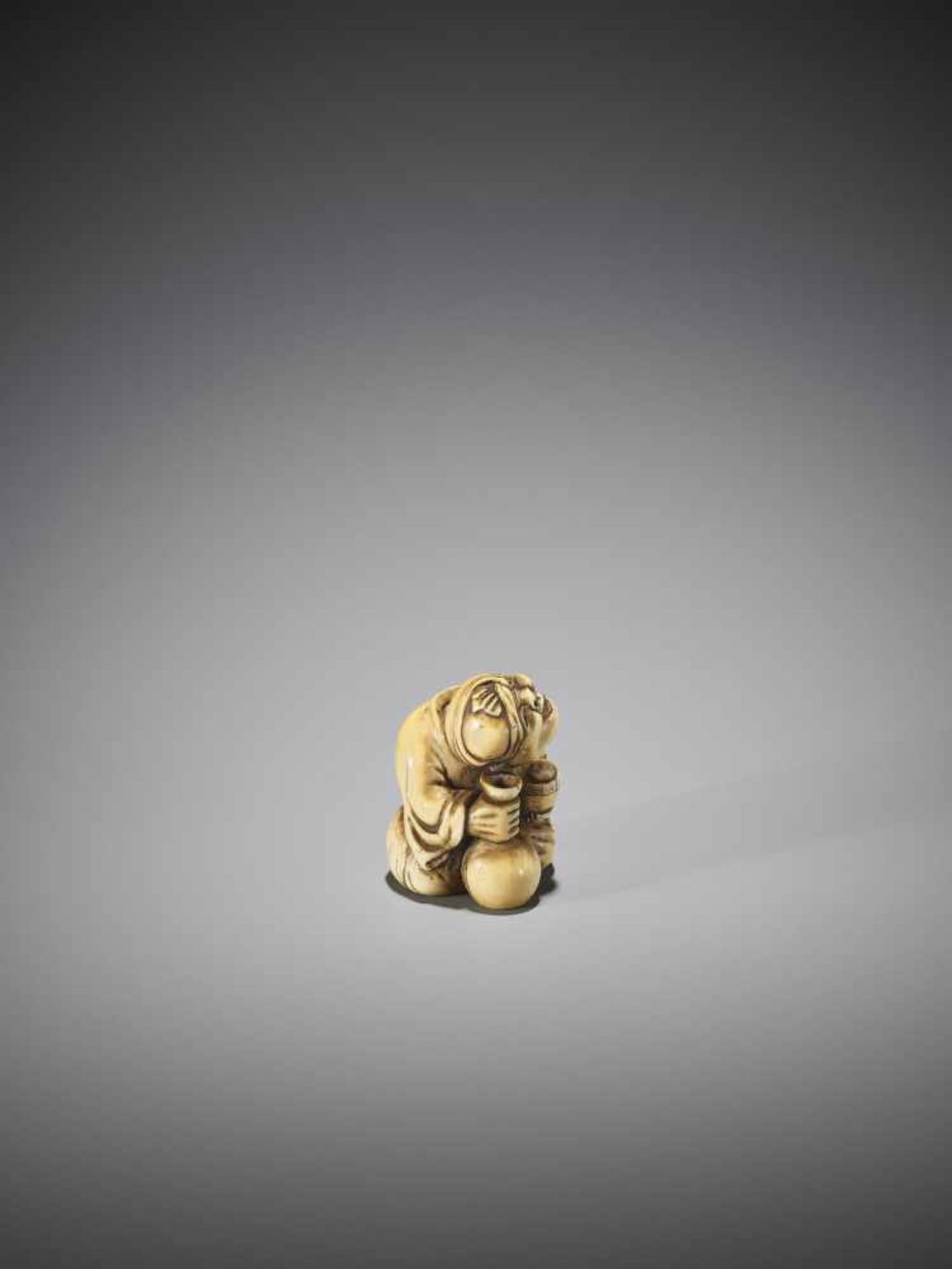 YOSHIMASA: A RARE IVORY NETSUKE OF A DRUNKARD - Image 6 of 8