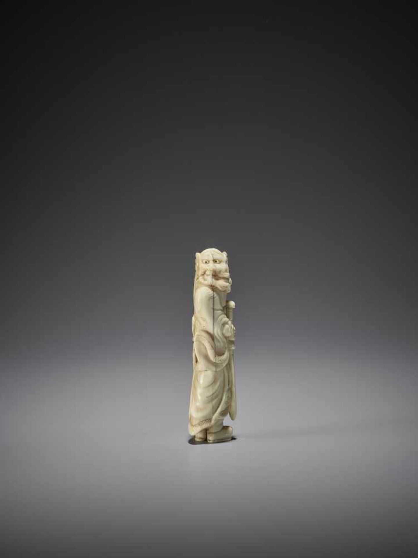 AN IVORY NETSUKE OF SHOKI - Image 3 of 9