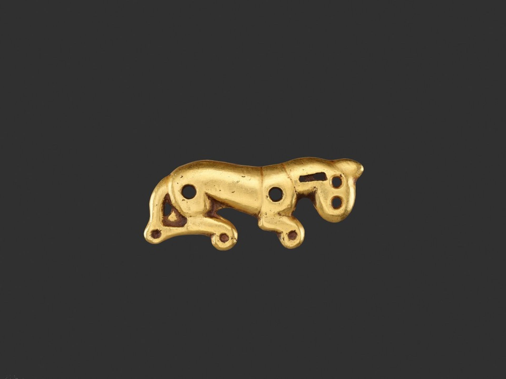 AN ORDOS GOLD ‘LEAPING TIGER’ PLAQUE, WARRING STATES China, Inner Mongolia, Ordos, 475-221 BC. The