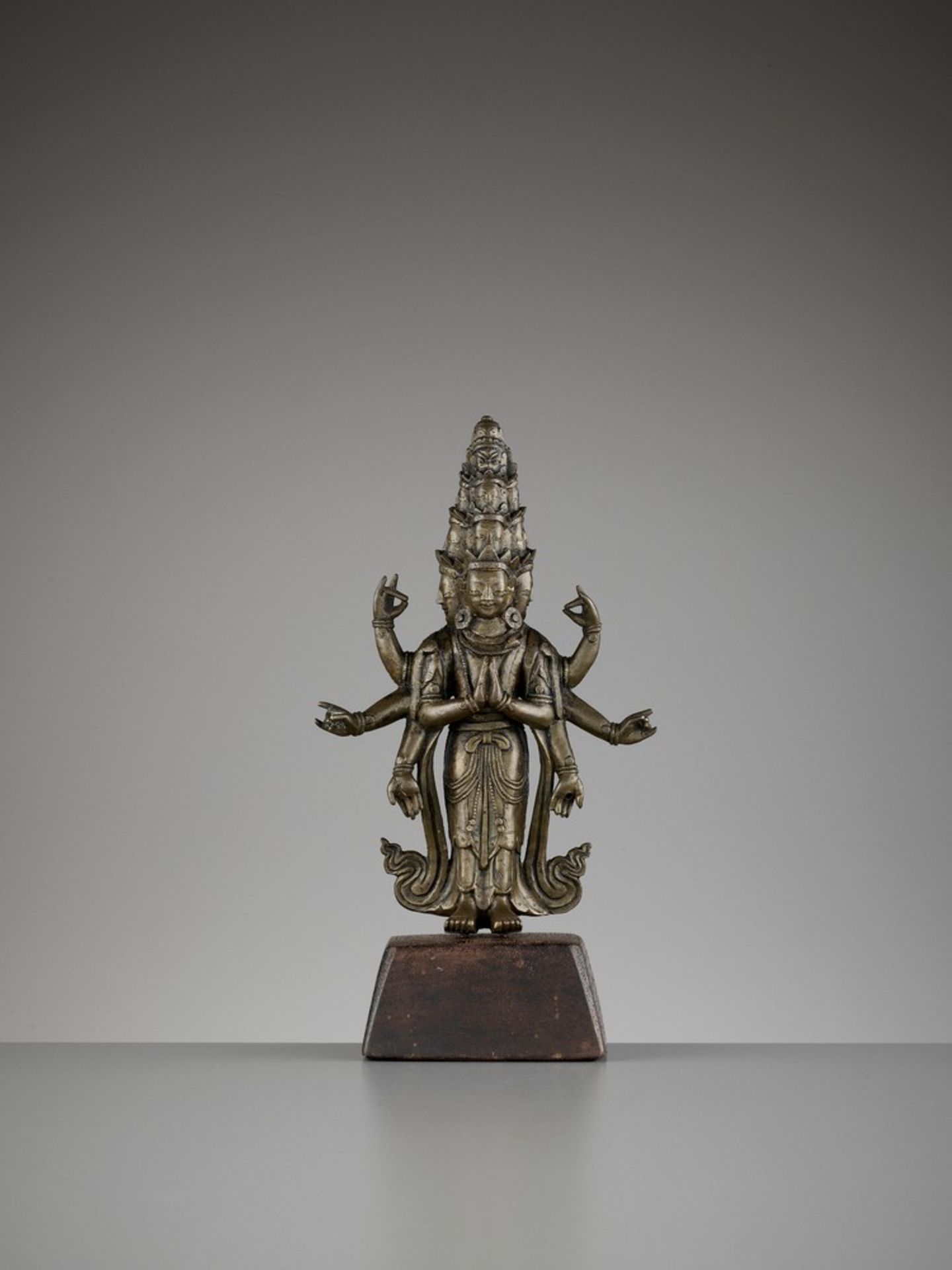 A SINO-TIBETAN COPPER ALLOY FIGURE OF EKADASHAMUKHA AVALOKITESVARA, QING