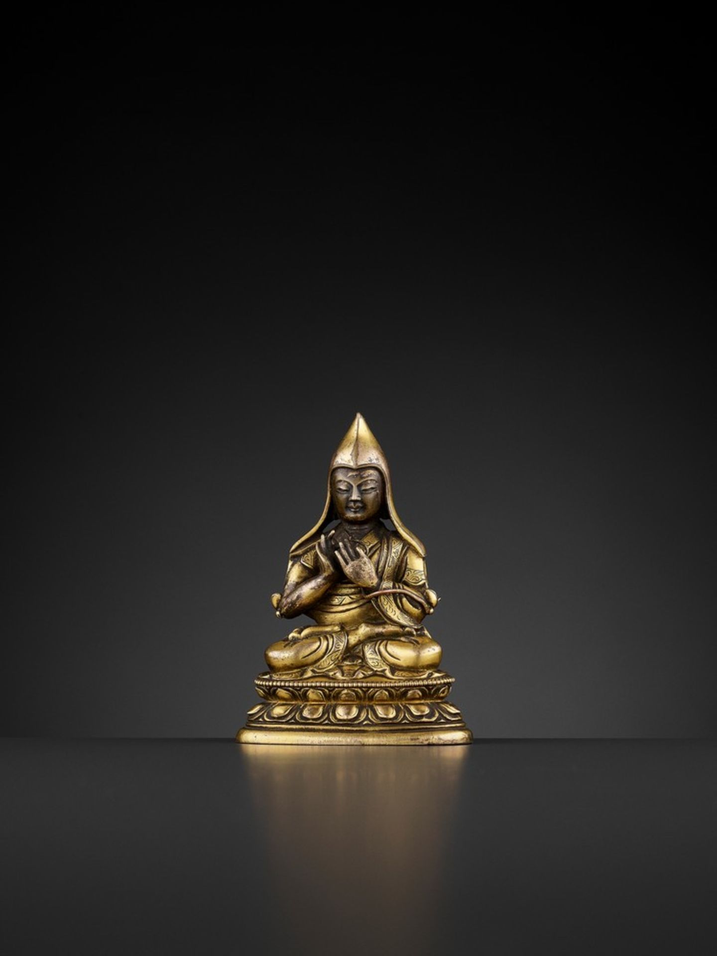 A GILT-BRONZE FIGURE OF TSONGKHAPA, QIANLONG PERIOD