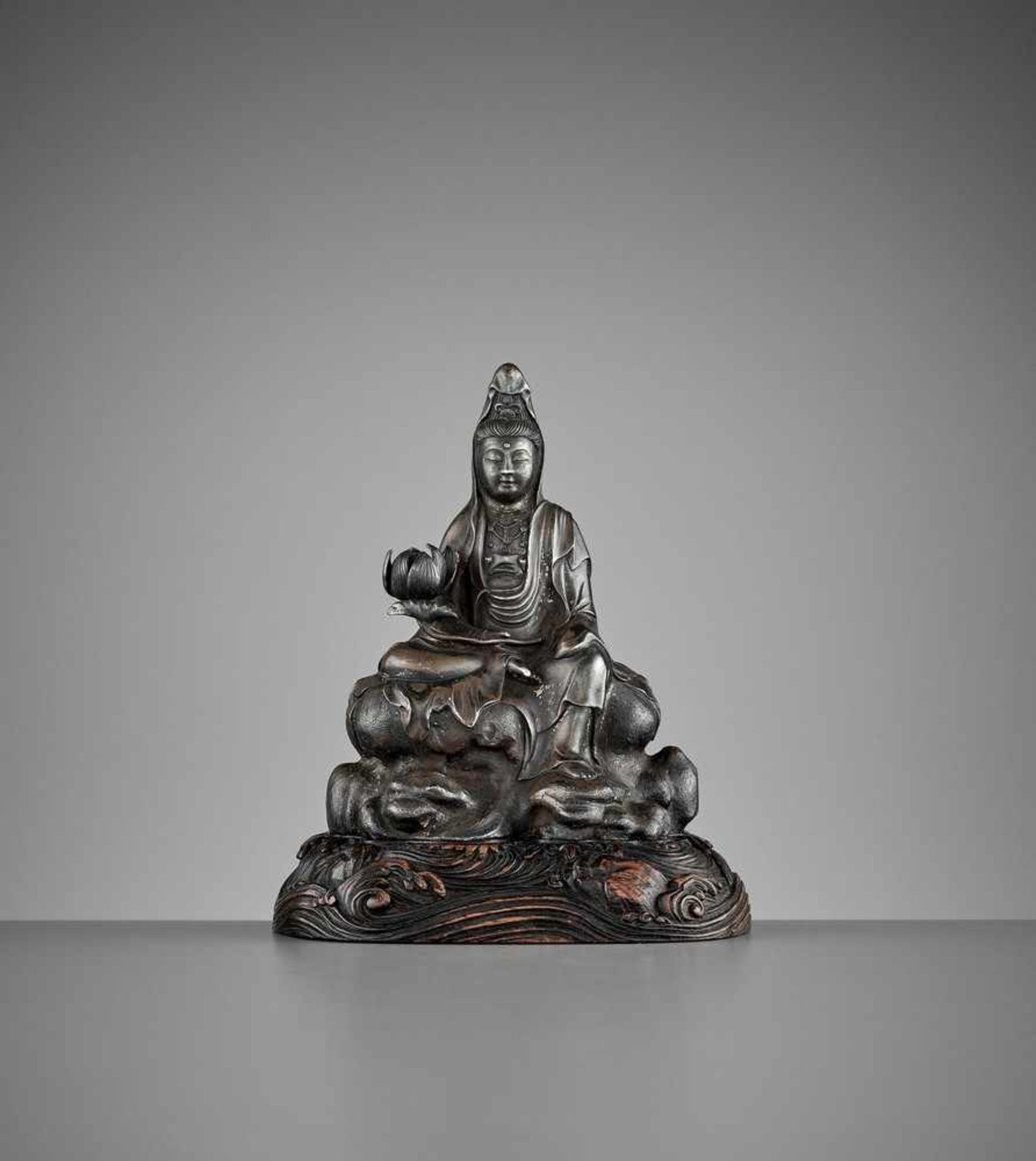 A SILVERED ‘ROYAL EASE’ BRONZE FIGURE OF GUANYIN, EARLY QING DYNASTY <br - Image 2 of 10