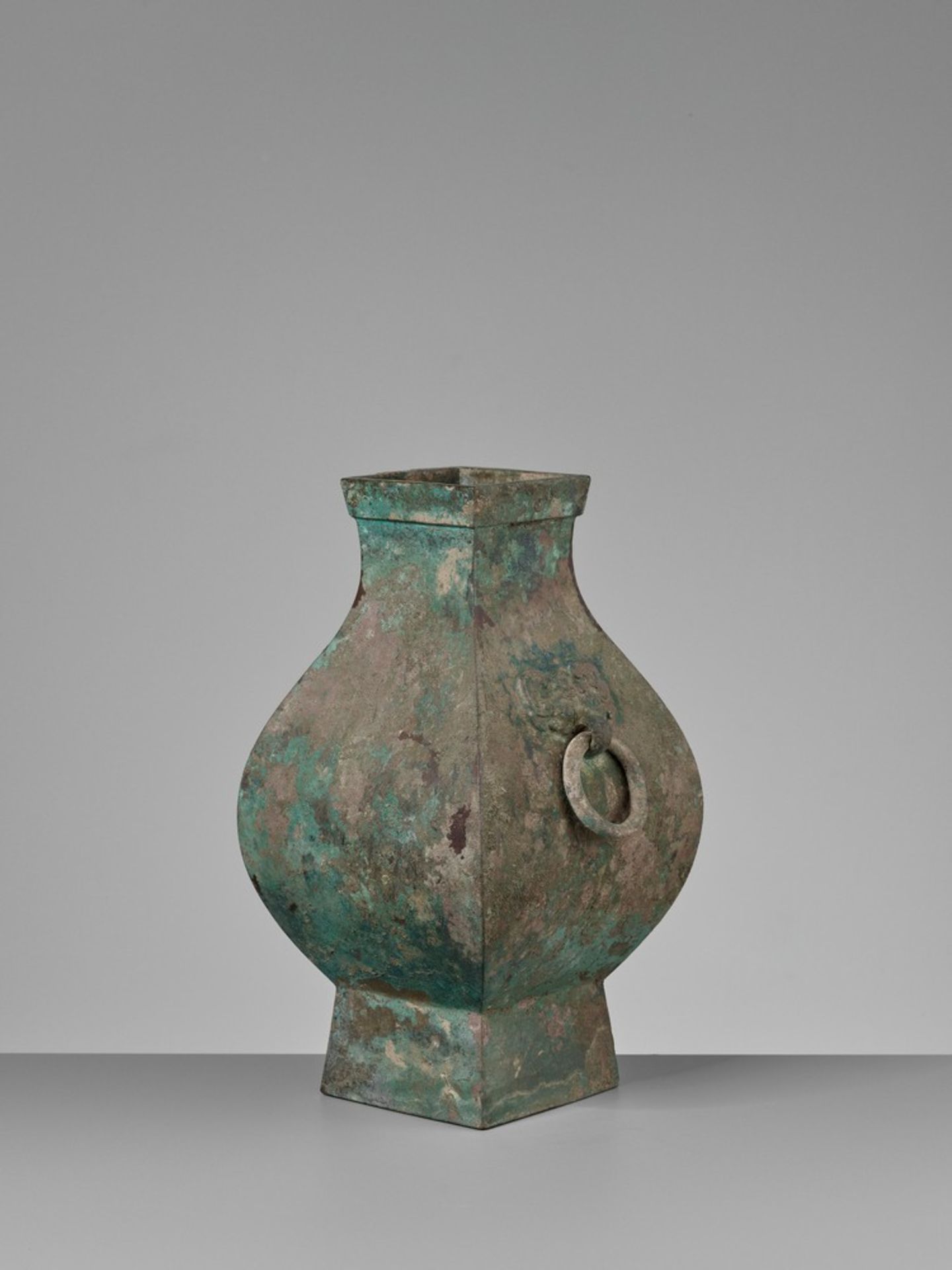 A FACETED BRONZE STORAGE VESSEL, FANGHU, HAN DYNASTY China, 206 BC-AD 220. The faceted pear-shaped - Image 12 of 20