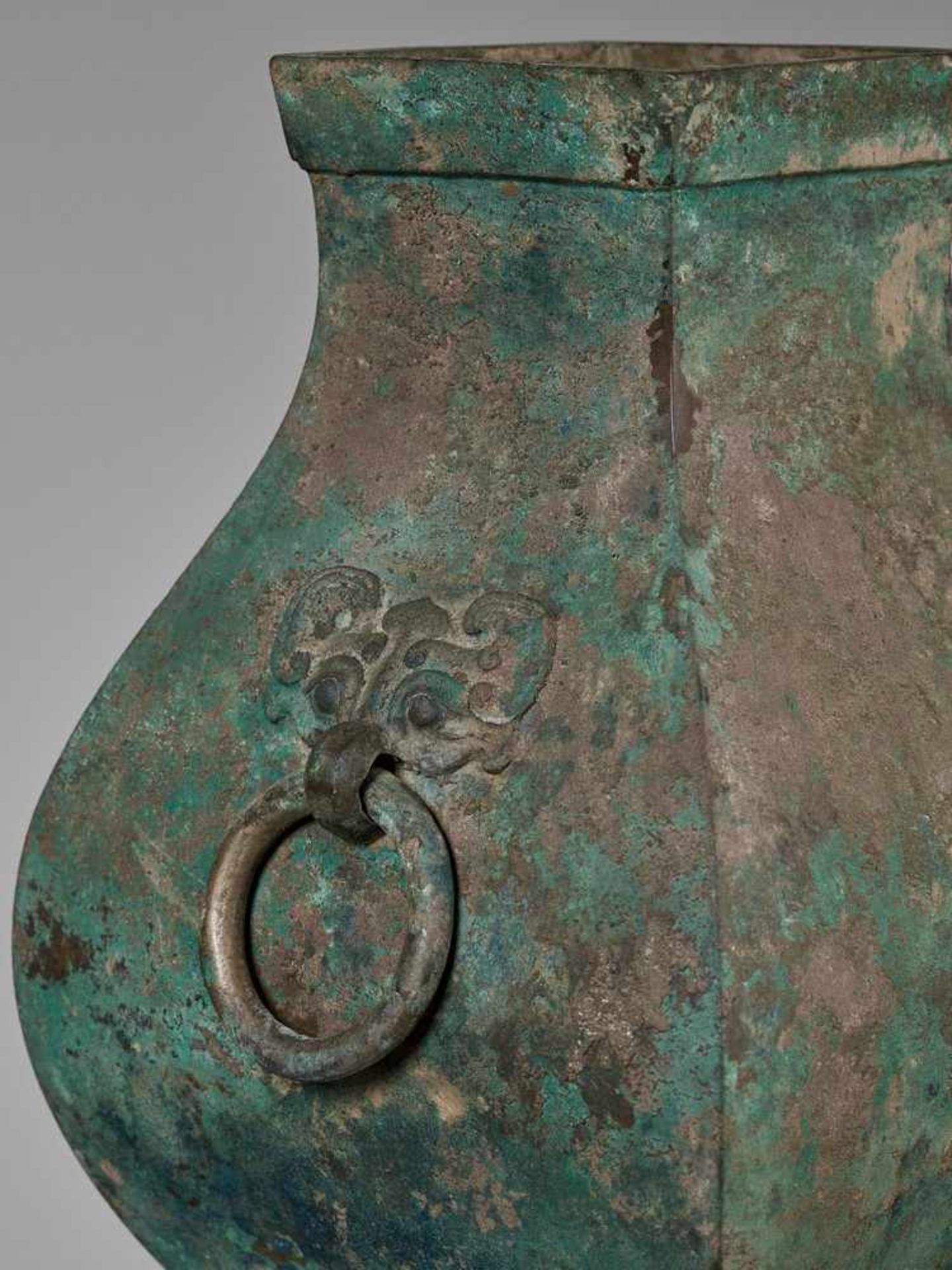 A FACETED BRONZE STORAGE VESSEL, FANGHU, HAN DYNASTY China, 206 BC-AD 220. The faceted pear-shaped - Image 5 of 20