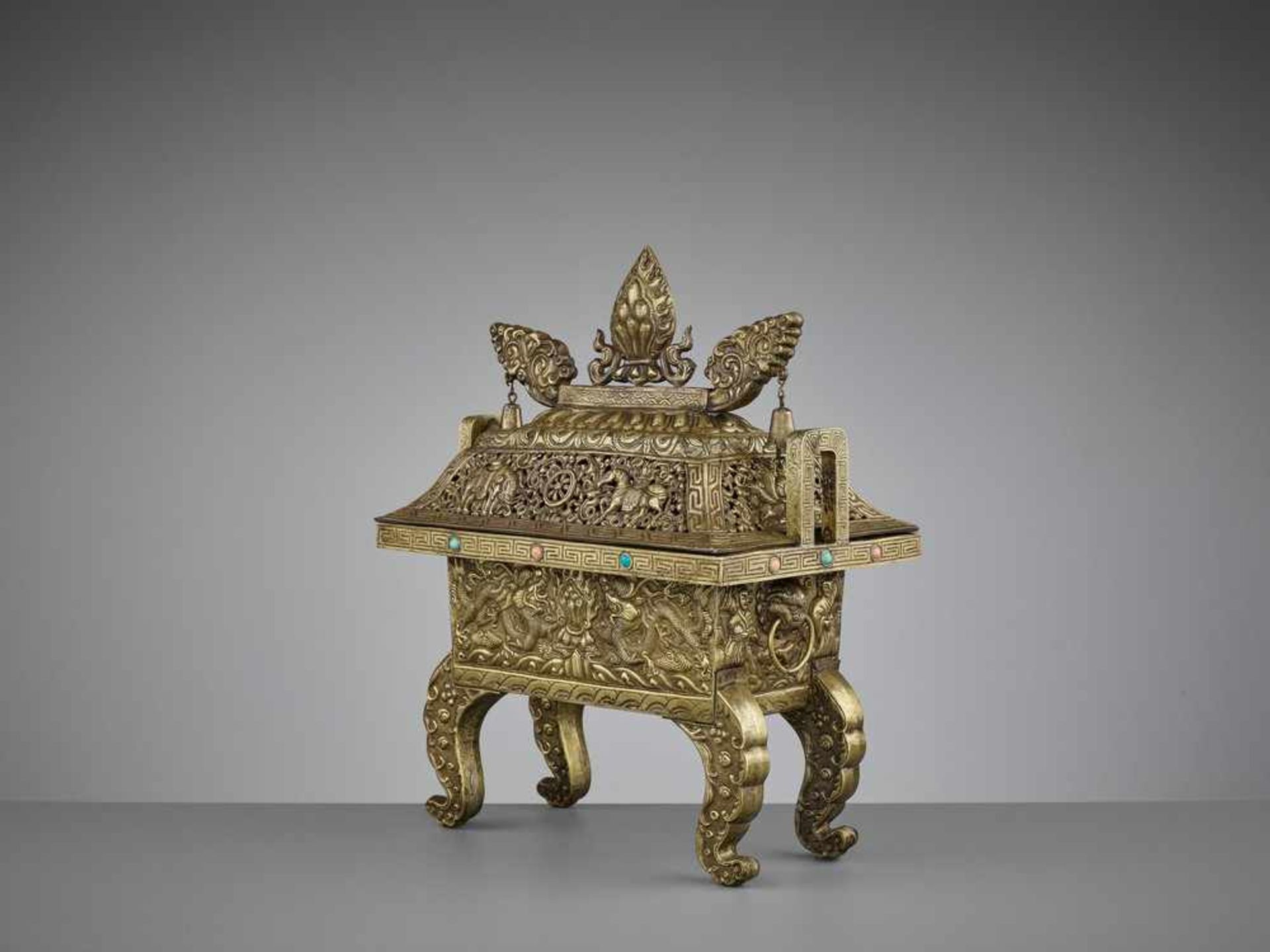 A LARGE GILT BRONZE AND COPPER REPOUSSÉ CENSER AND COVER, FANGDING, QING DYNASTY <