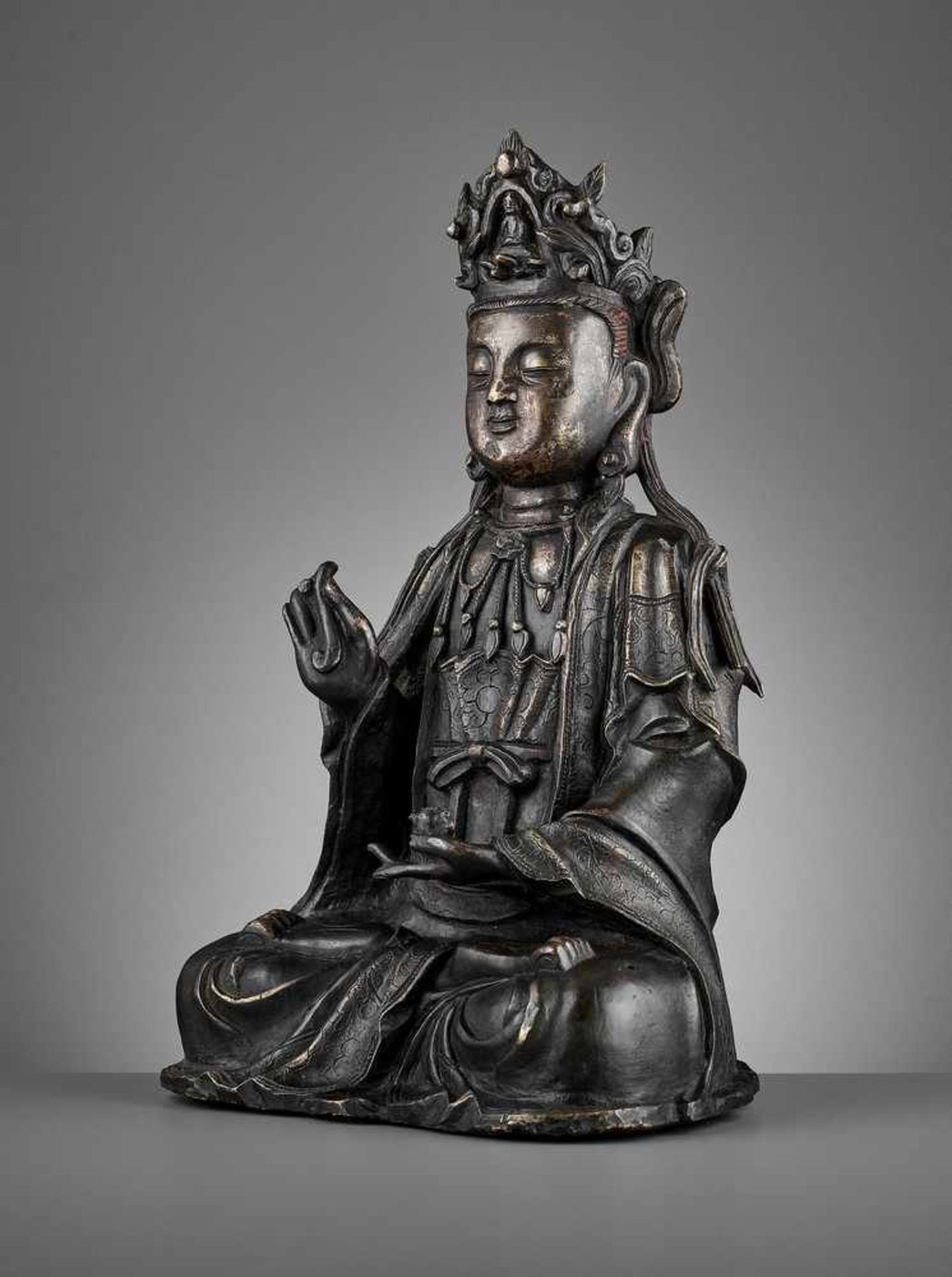 A VERY LARGE GILT-BRONZE FIGURE OF AVALOKITESVARA, MING DYNASTY