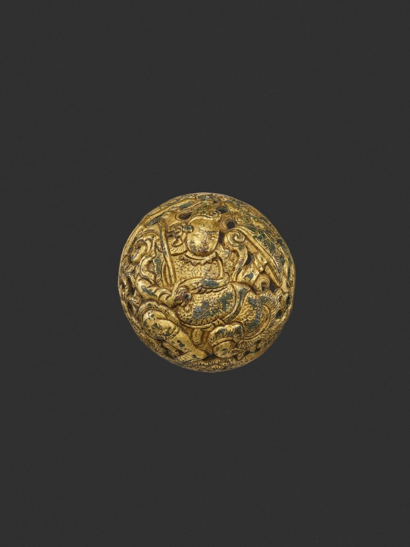 A GILT-IRON REPOUSSÉ ‘VIRUDHAKA’ SADDLE COVER FITTING, MING <br /