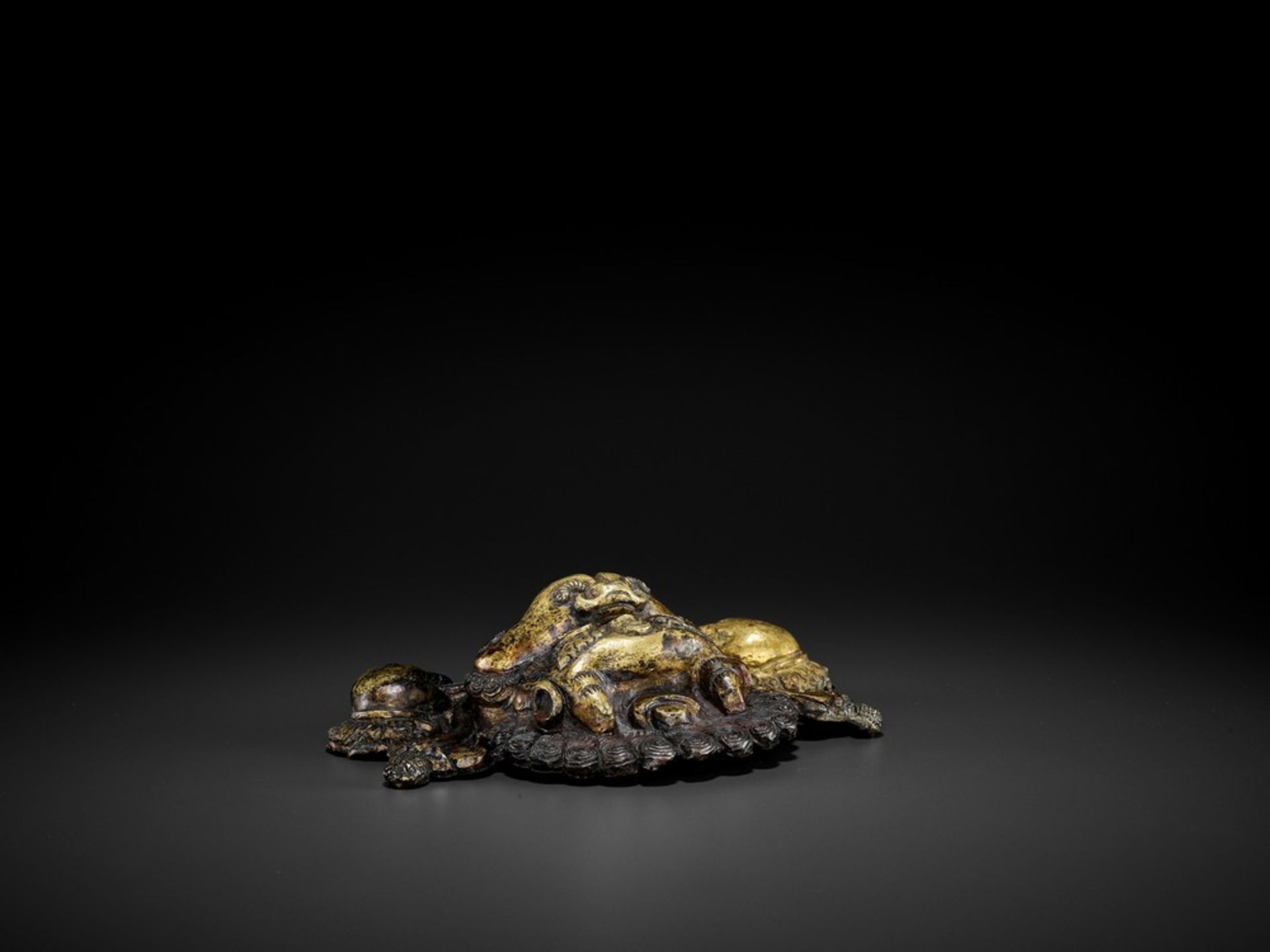 A COPPER REPOUSSÉ AND RELIEF FIGURE OF A SNOW LION DANCER, QING < - Image 8 of 8