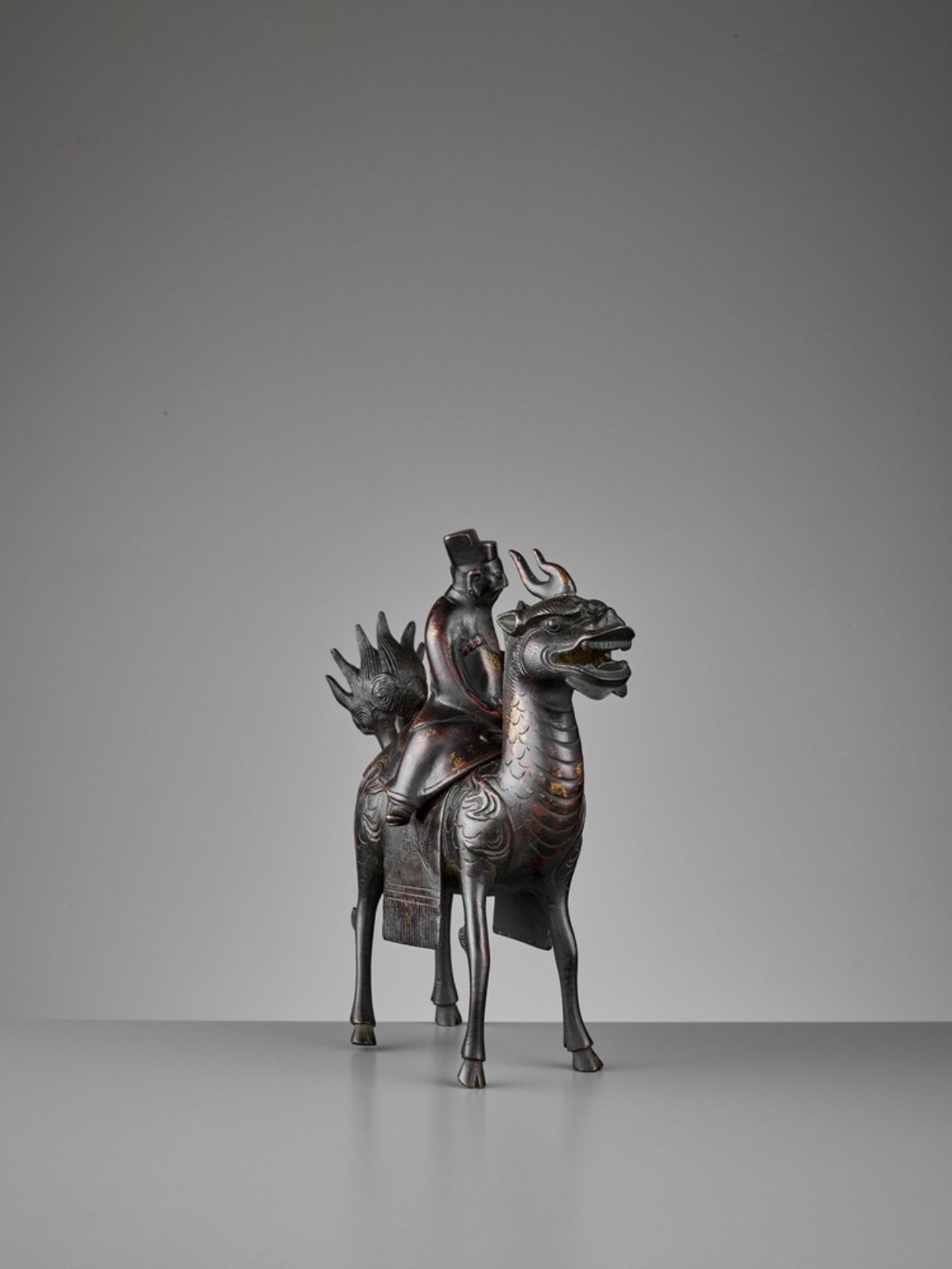 A ‘QILIN AND DIGNITARY’ BRONZE CENSER, QING <br - Image 7 of 13